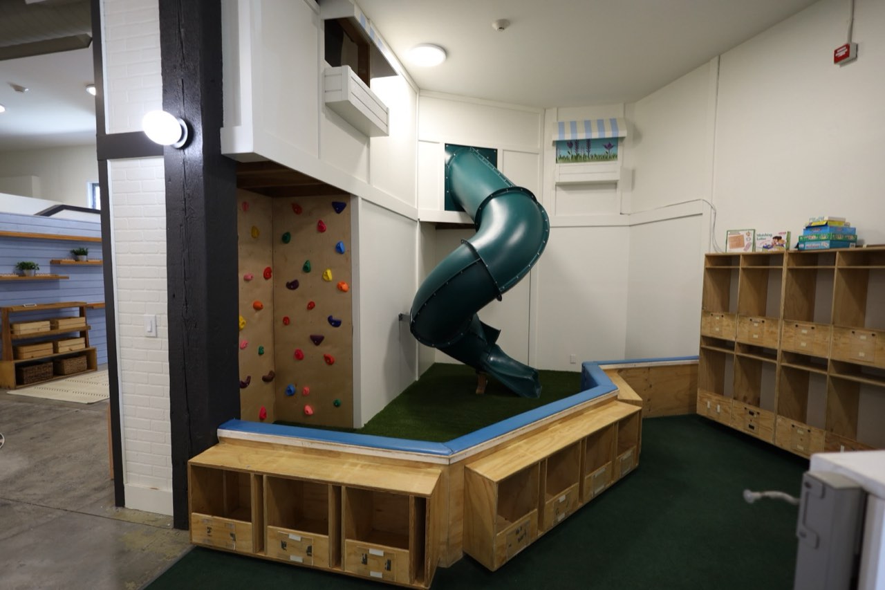 Indoor climbing wall and spiral slide
